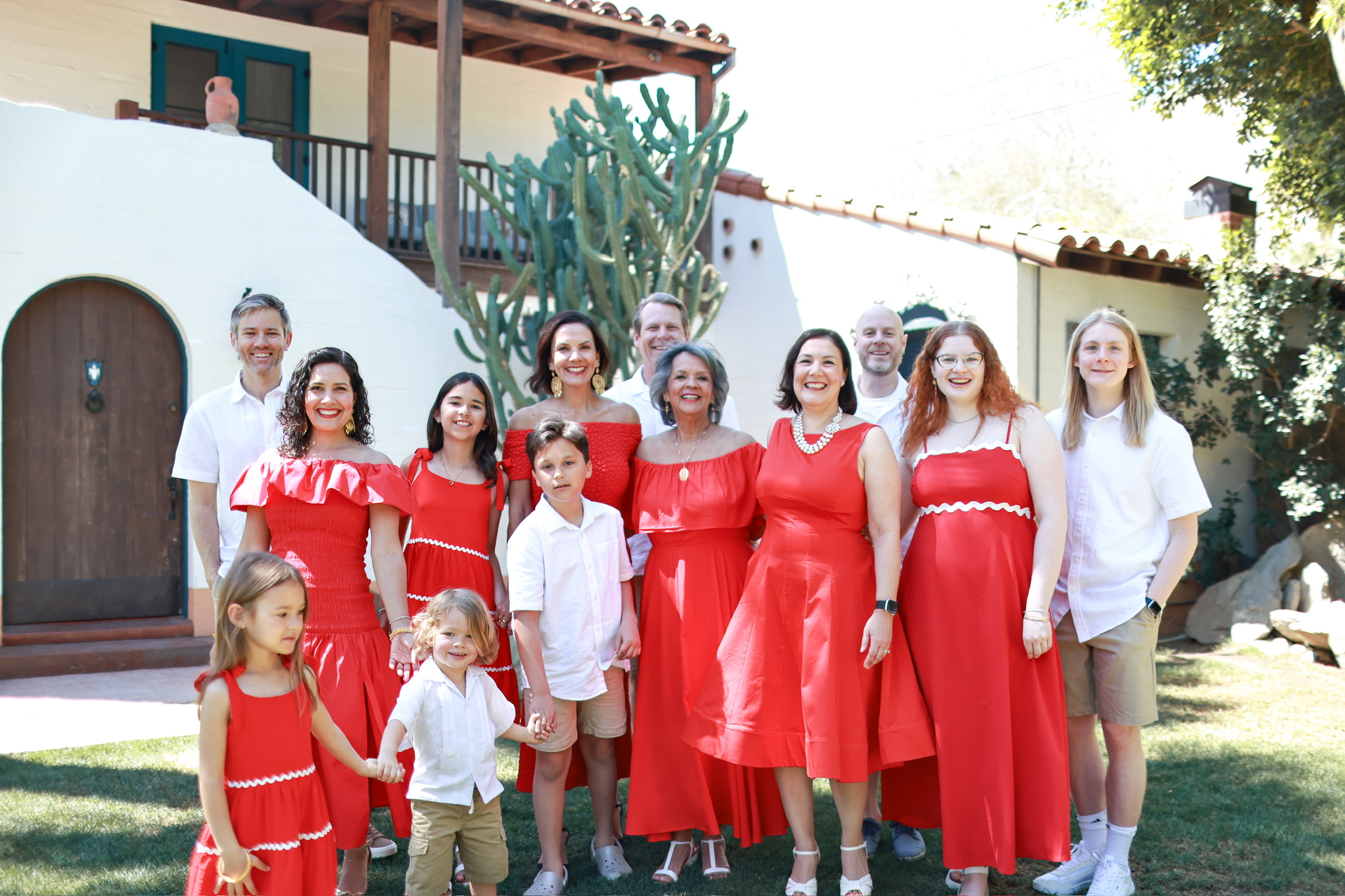 Family portrait in coordinated red dresses